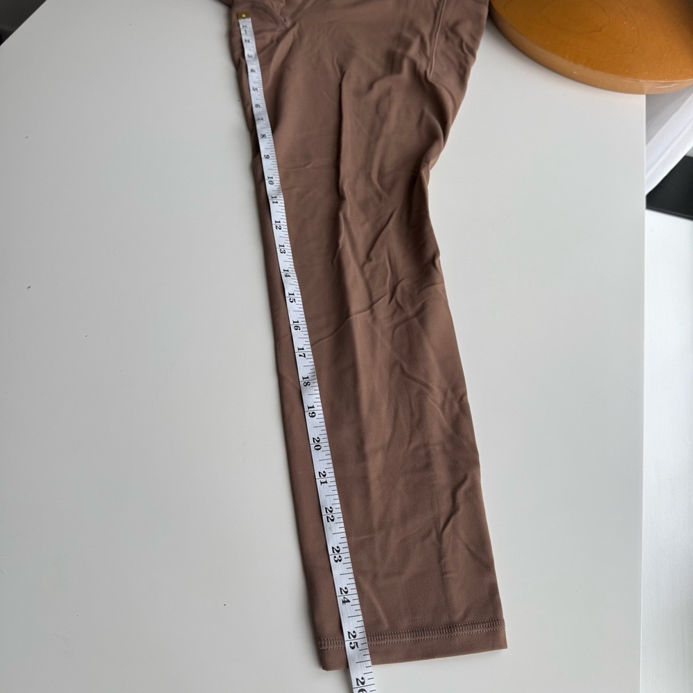 Athleta Salutation Stash Tight Size Large - Picture 8 of 8